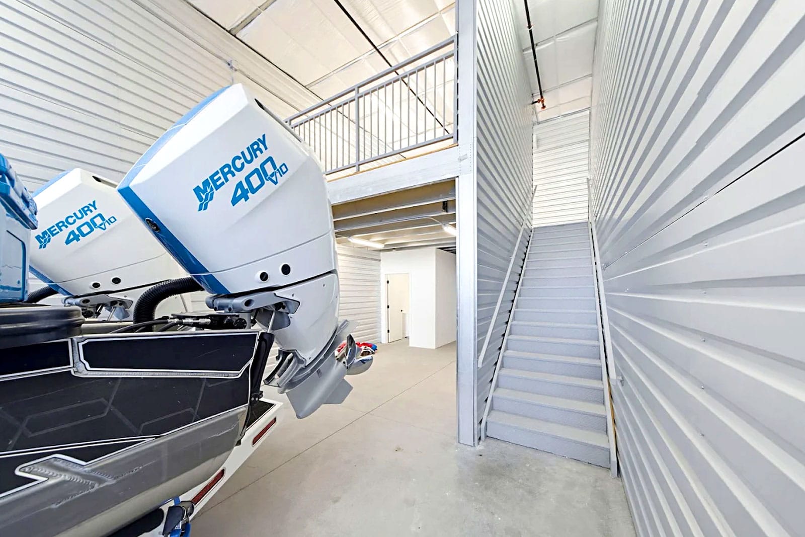 Mezzanine and stairs above a boat storage space
